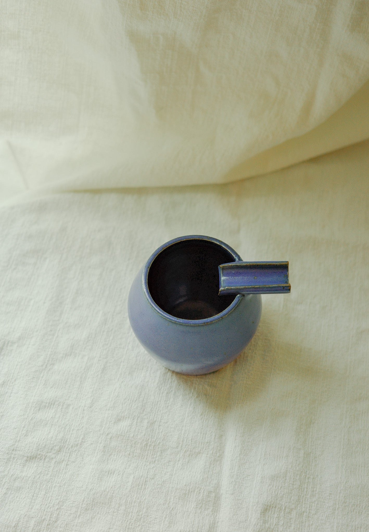 Bright blue ashtray (second)