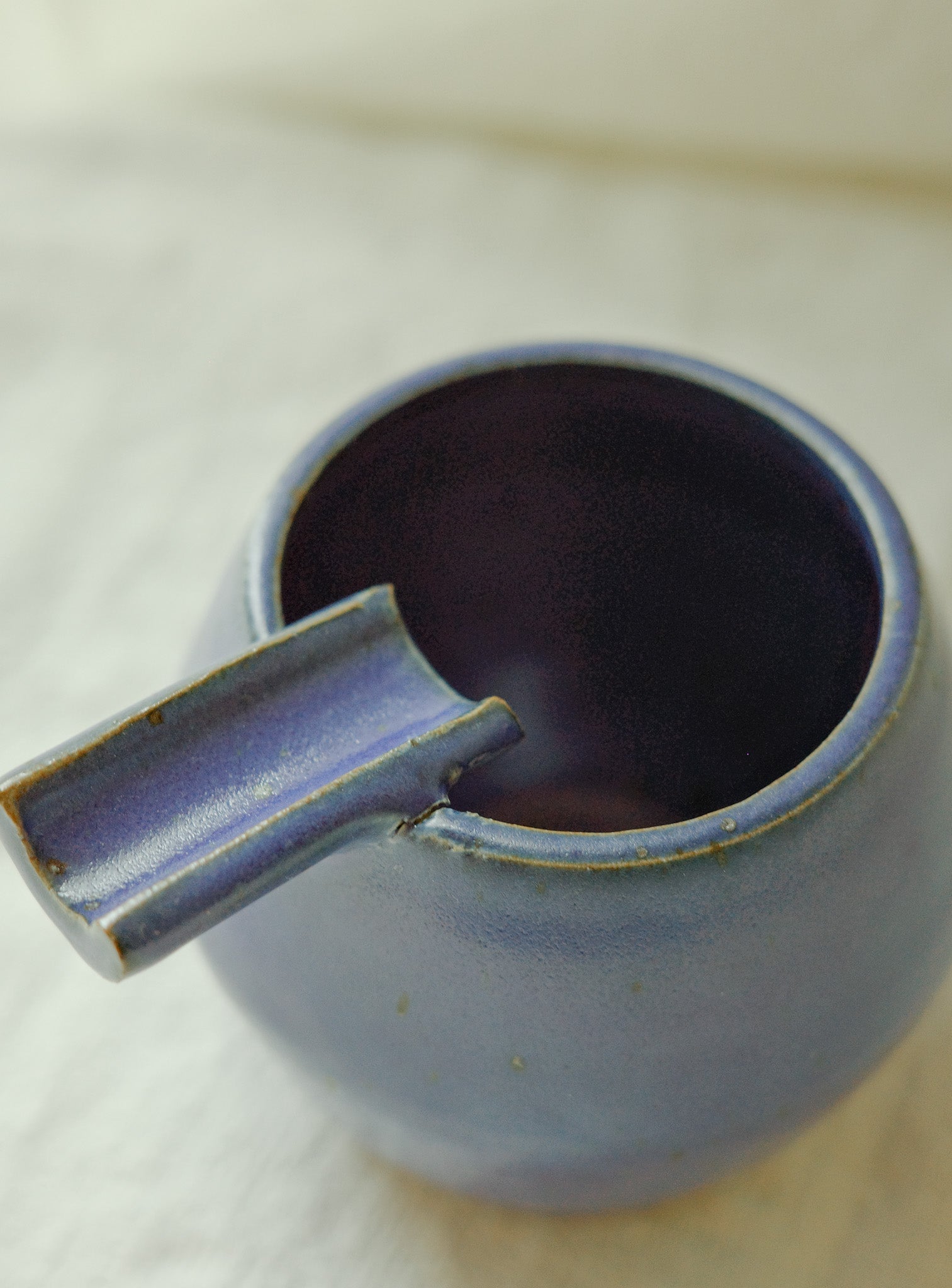 Bright blue ashtray (second)