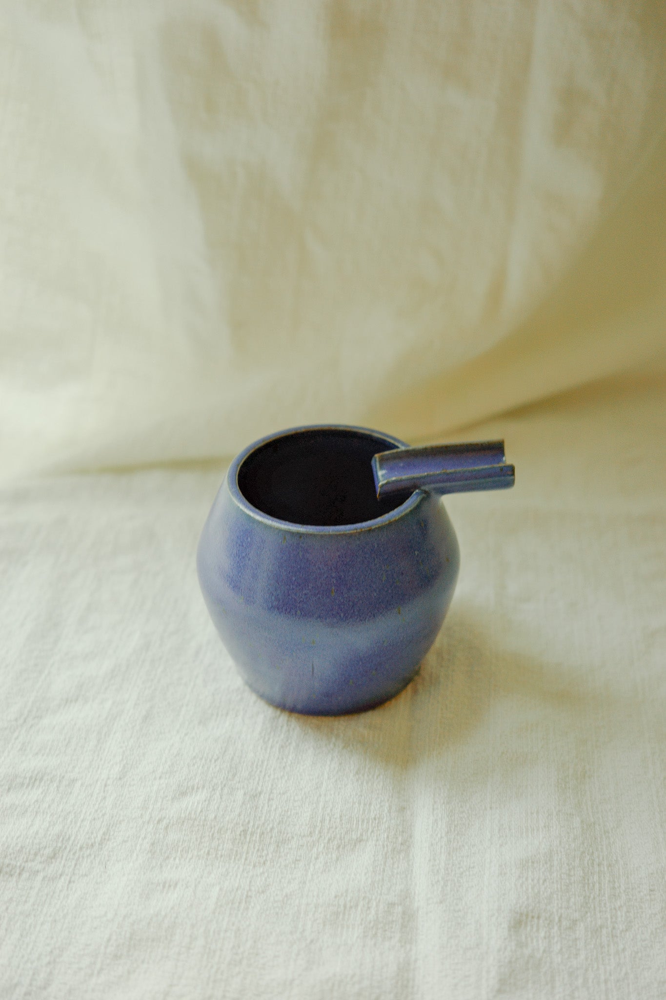 Bright blue ashtray (second)