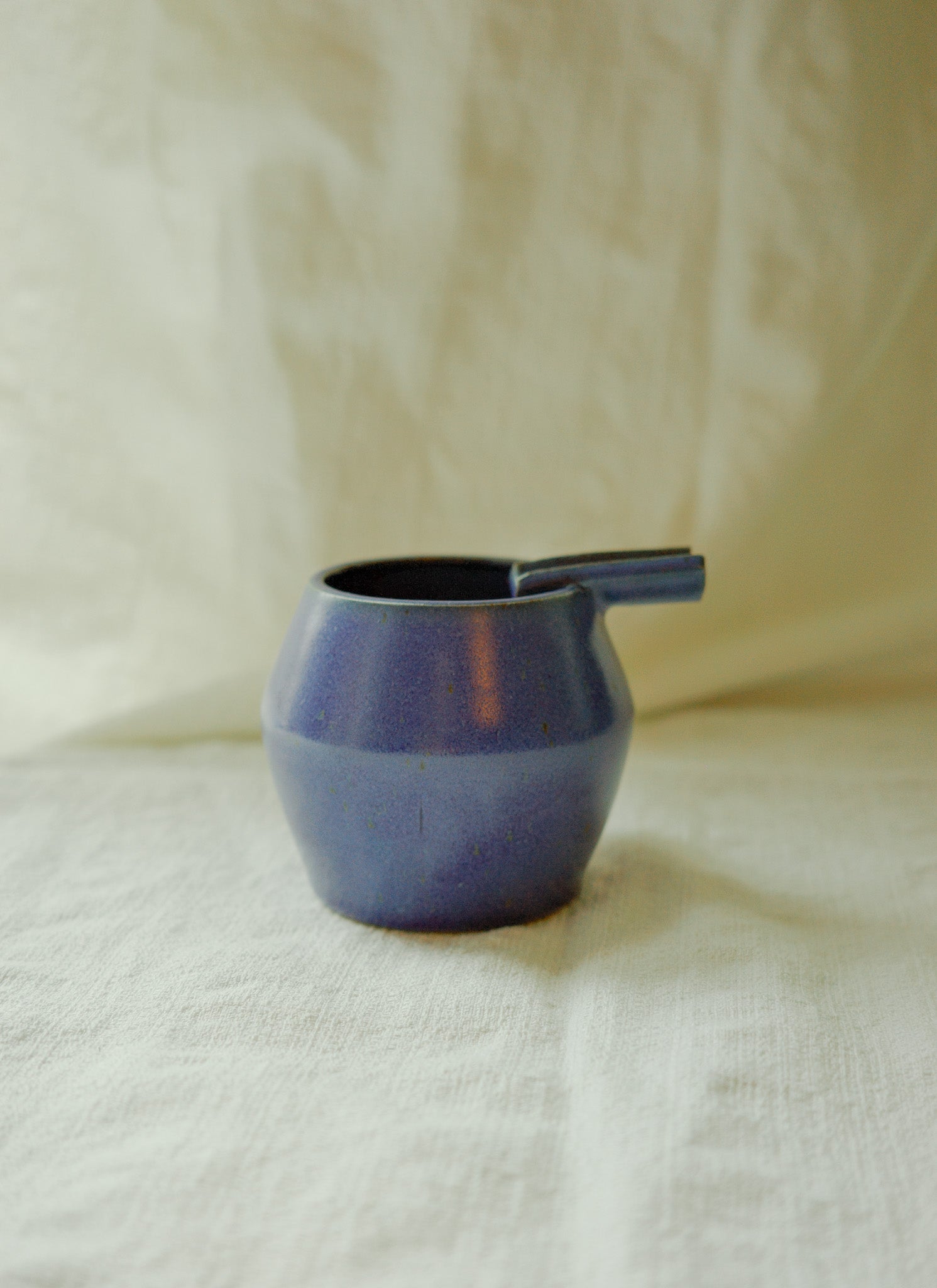 Bright blue ashtray (second)