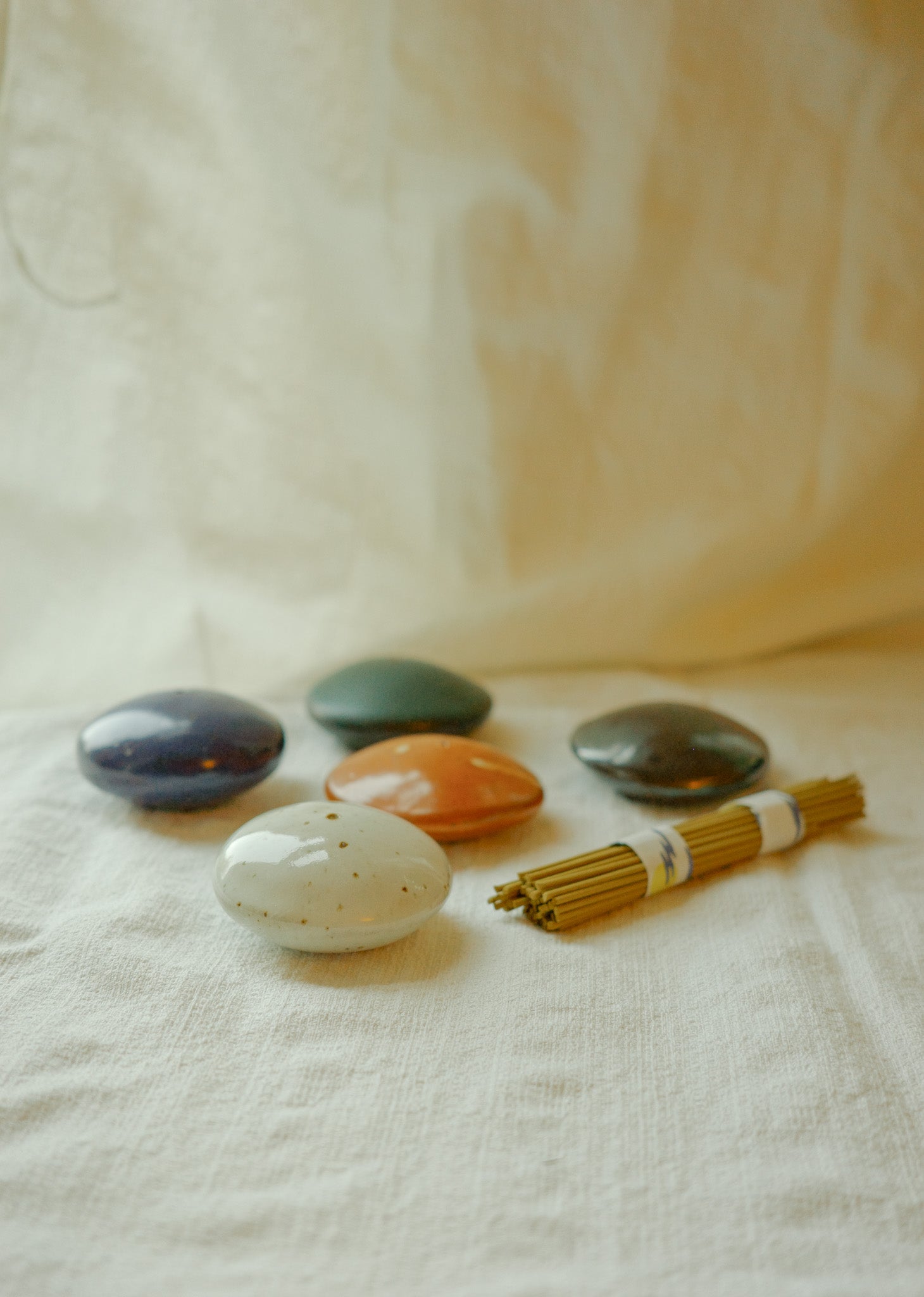 Small pebble incense holders